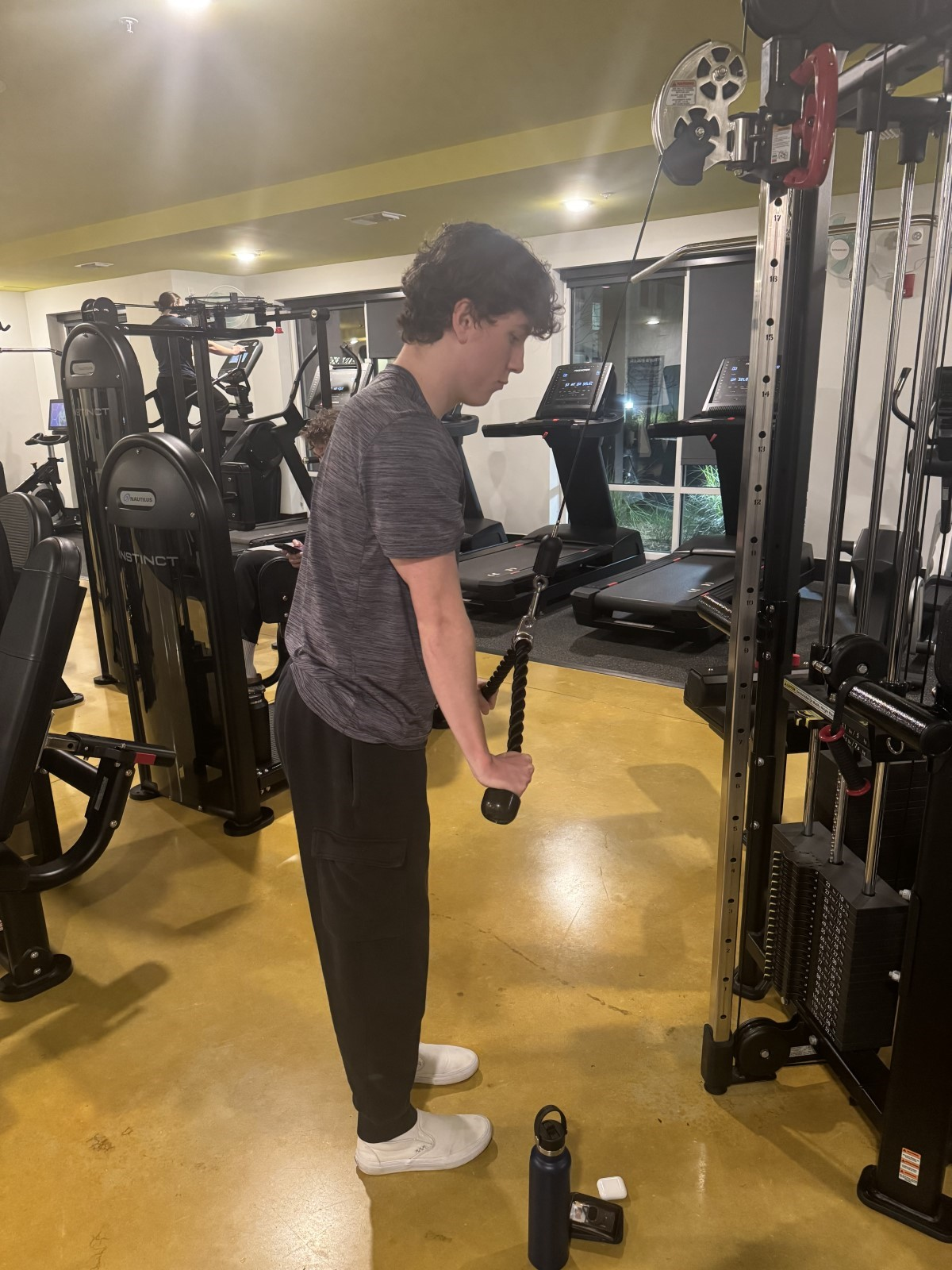 End the exercise with your arms fully extended, still at your sides.